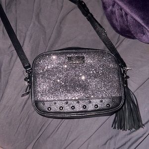 Victoria's Secret Black and shiny silver on the front !